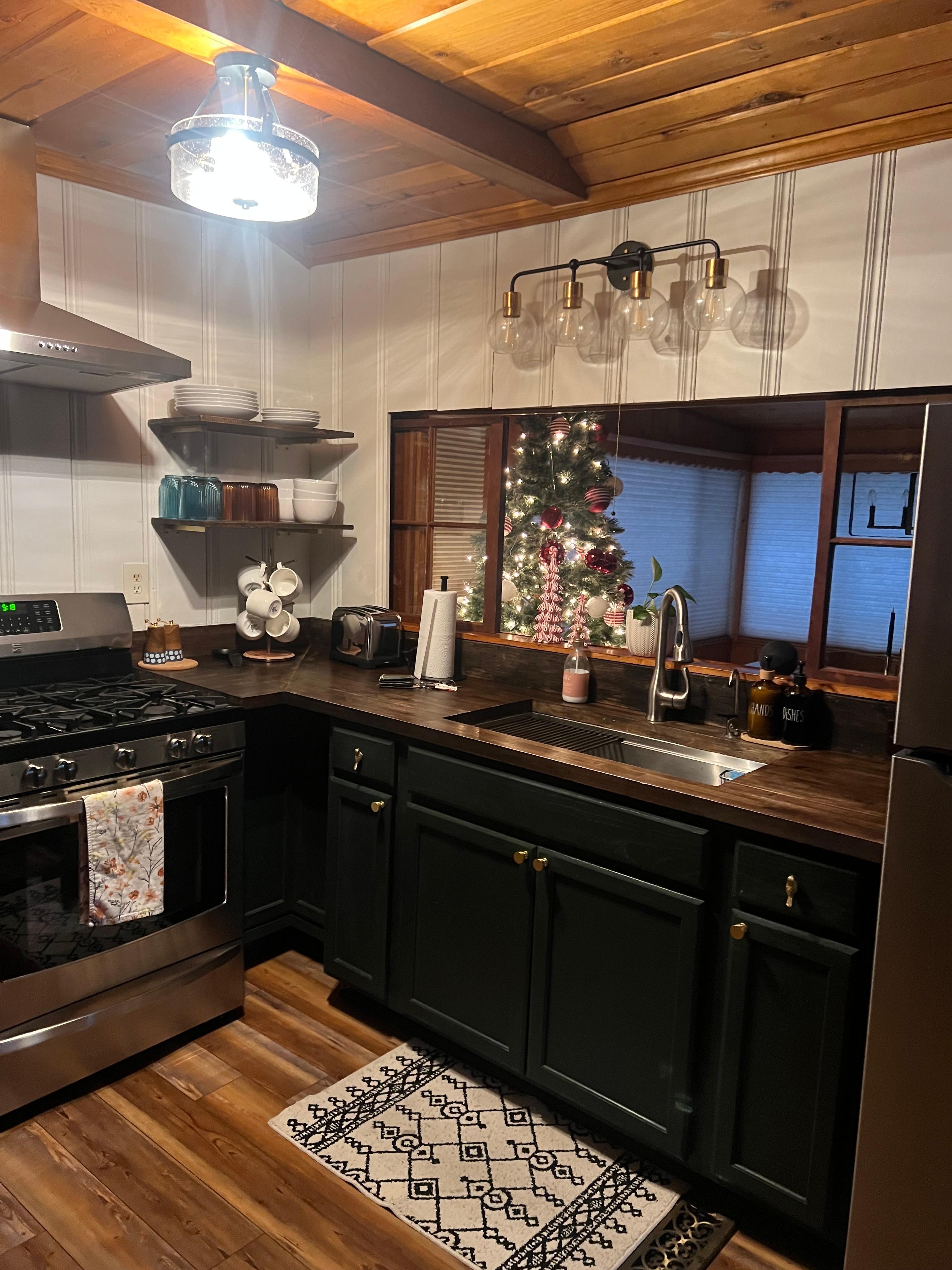 Well-stocked kitchen - again beautifully decorated. 