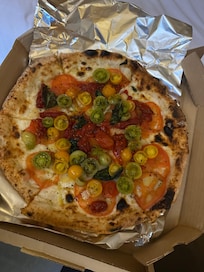 Pizza vom Hotel als Zimmerservice