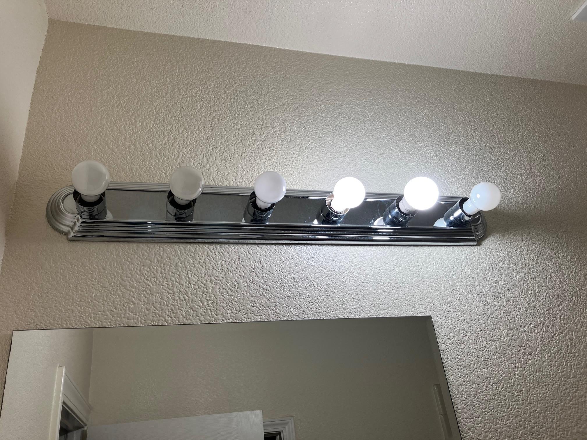 Light fixture in the downstairs full bath