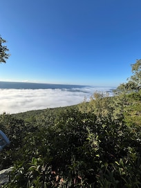 Clouds in the valley below