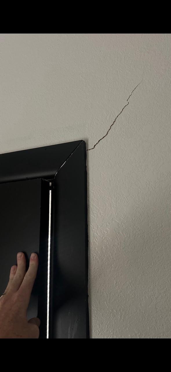 Cracks in walls and doors that won't shut.