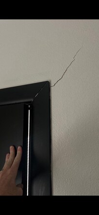 Cracks in walls and doors that won't shut.