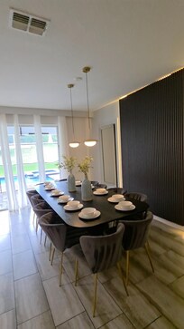 Dinning area with pool background