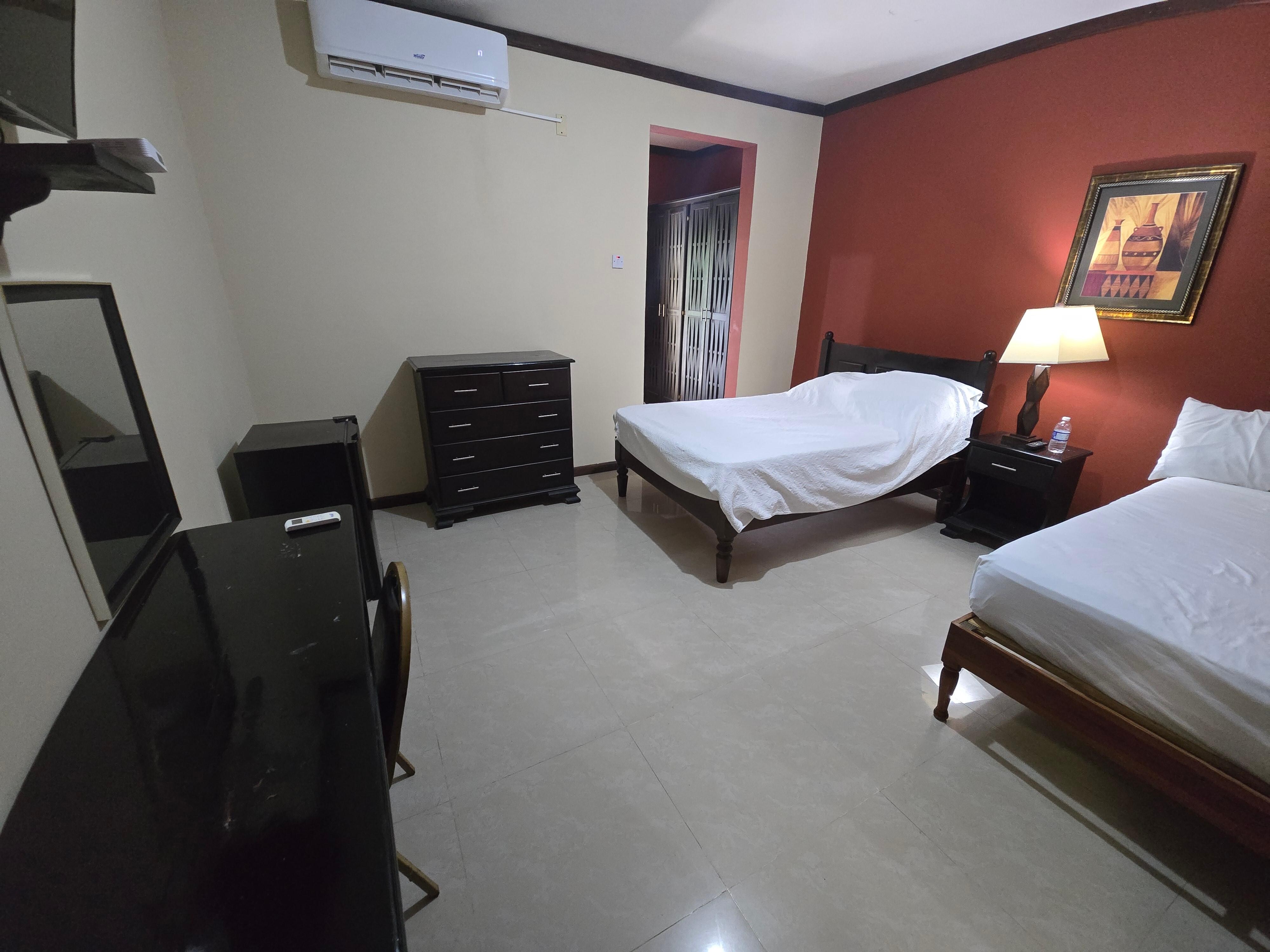Big rooms & bathrooms with great AC and WiFi and fridge