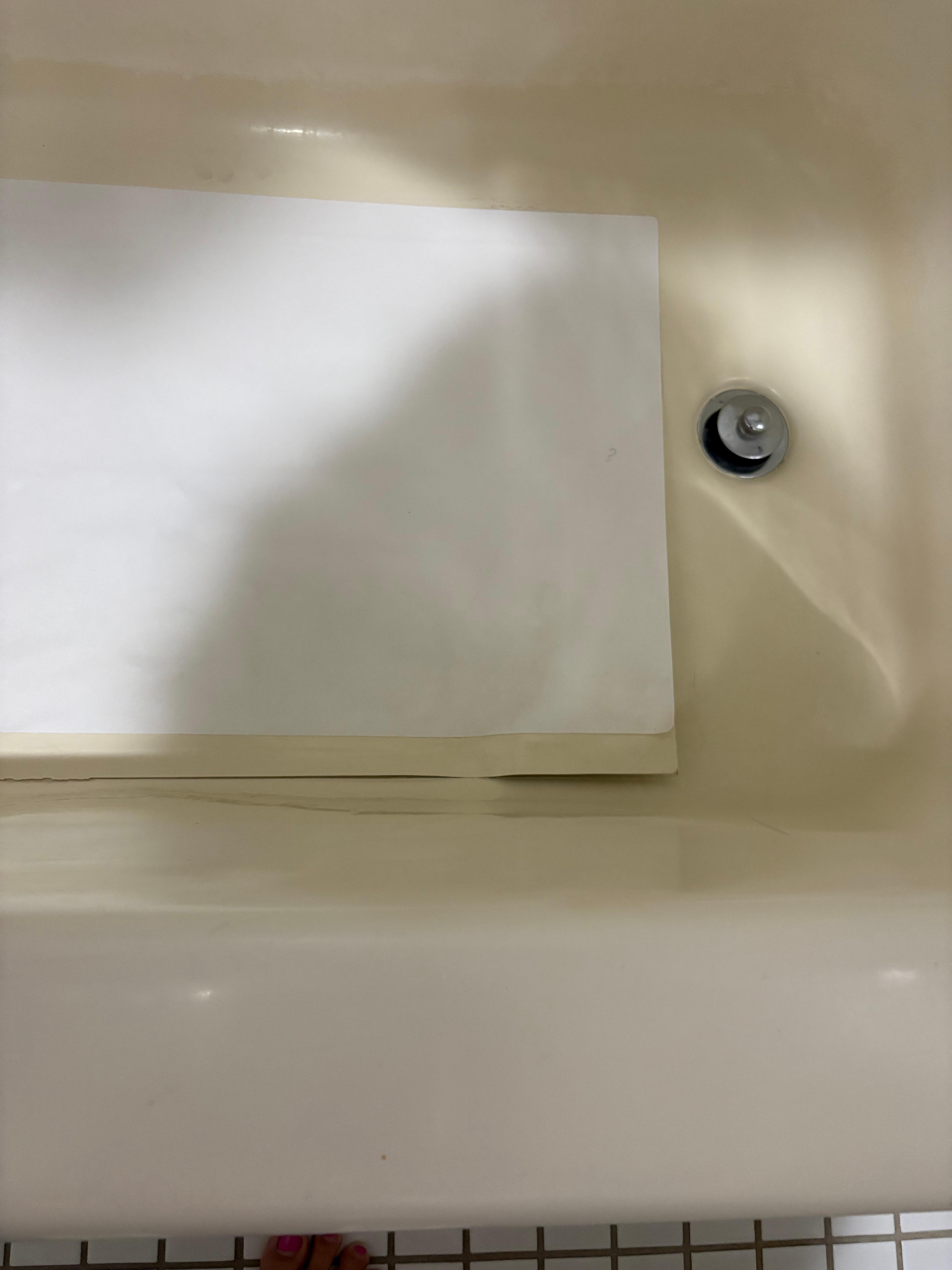 Tub patch covering holes and damage. 