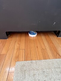 Oder absorbing disc in dining room to mask odor