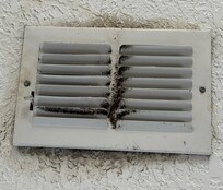 Close up of the A/C vent above the dining room table