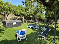 Lounge chairs near pool area.