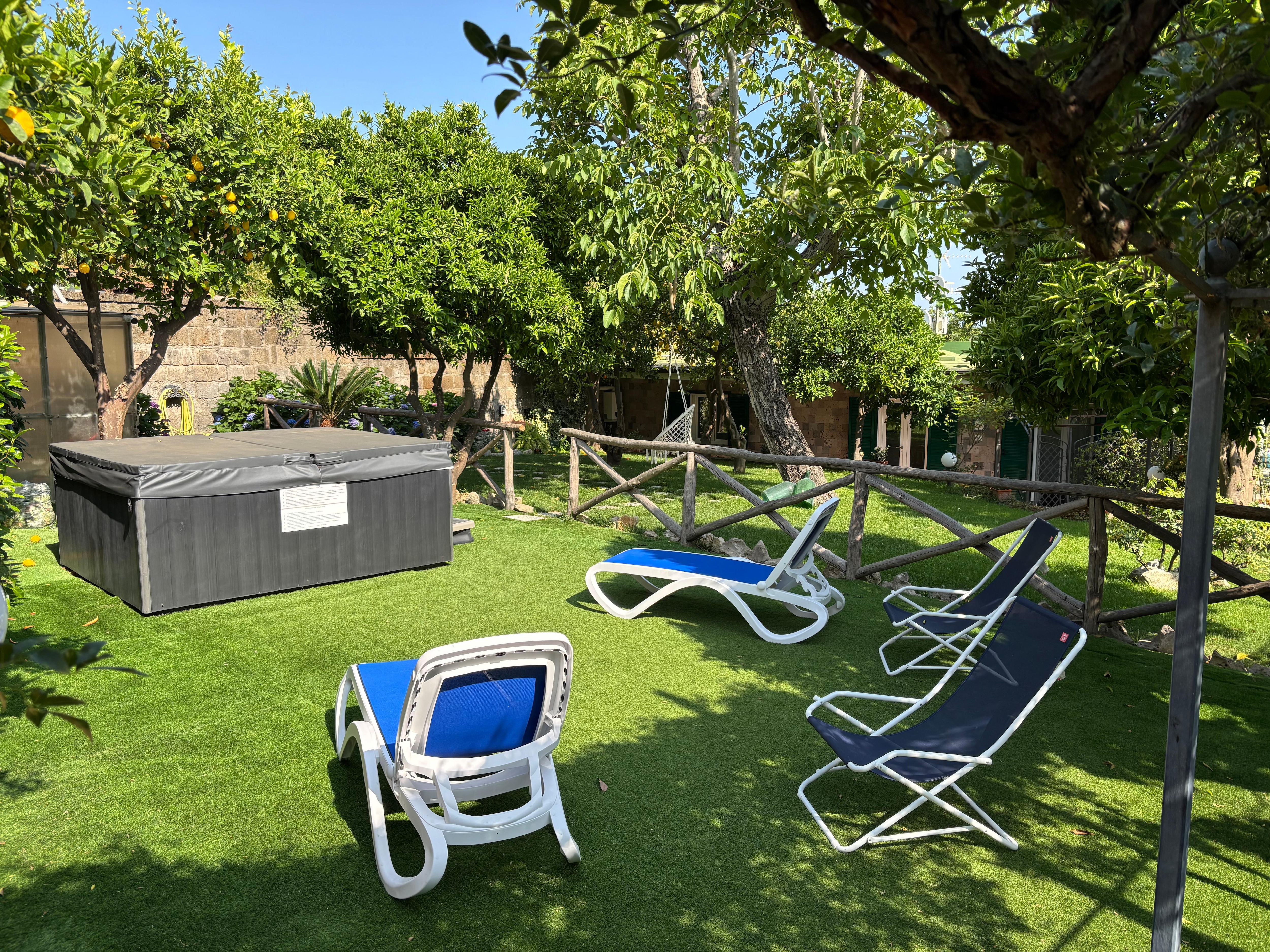 Lounge chairs near pool area.