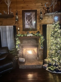 Beautifully decorated for the holidays complete with a wonderful fire place
