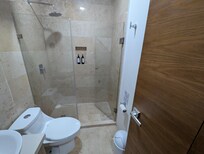 Nice size shower and decent bathroom, A little dark in the vanity area.