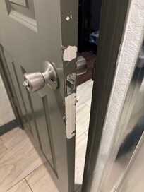 Inside of door where people of clearly rubbed edge off trying to close