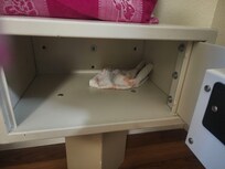 No clue what this was and was not willing to touch it. So just clised the door..Was in the safe,