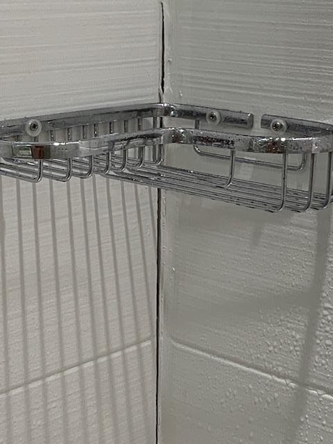 Holder falling off wall & wall cracked