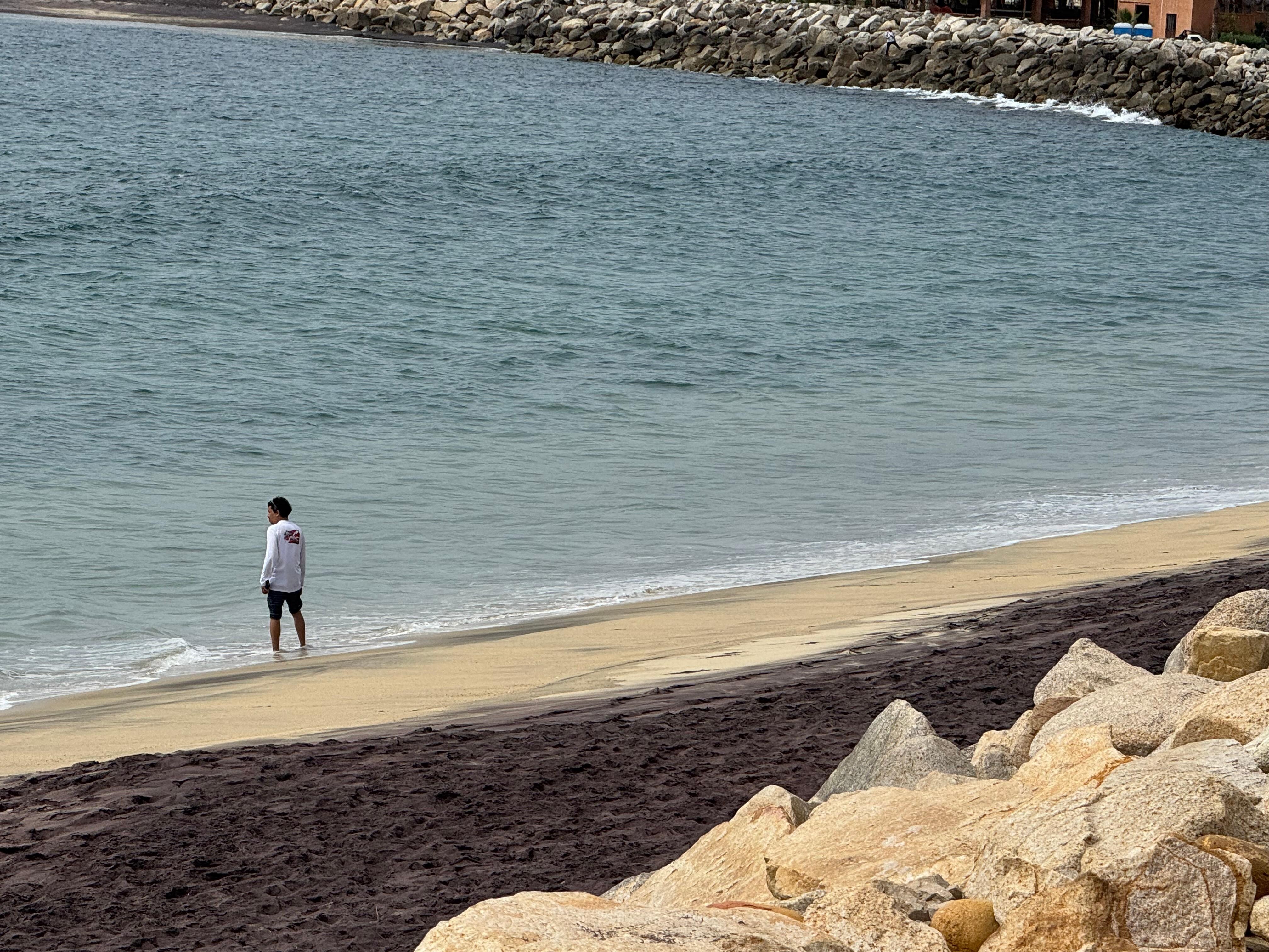 Walking distance beach lost of rocks to climb down to get on the beach