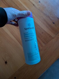The hot tub chemical bottle - empty.