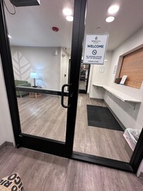 Waiting area outside locked lobby.