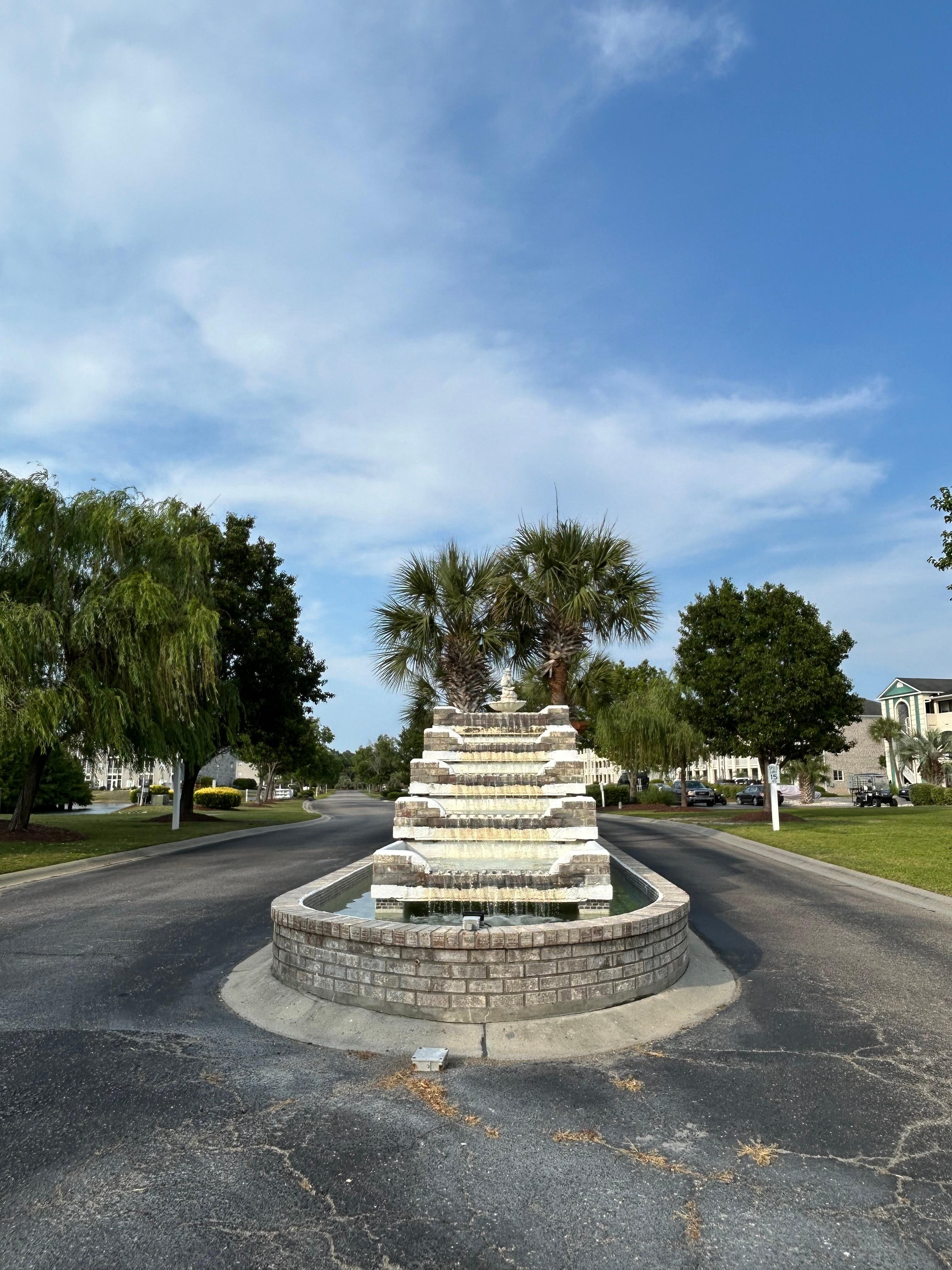 Fountains on main road of complex