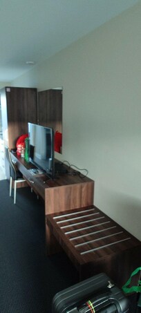 TV and media station in front of door