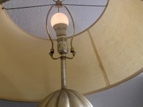 lamp broken at base and leaning- no knob to turn off