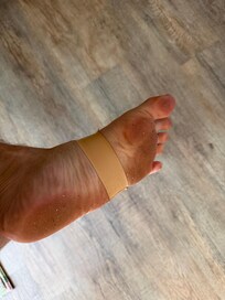 my foot after walking on her floor for a short time.