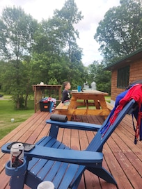 My grandson having a snack on the deck!