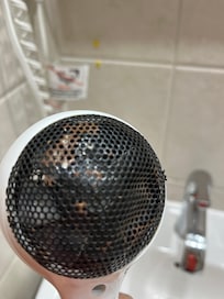 The rusty hairdryer that kept snagging my hair