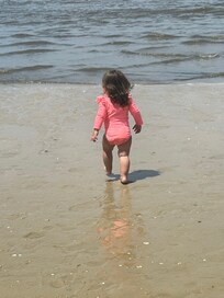 Mia loved the bay and ocean beach so much, she never wanted to leave.