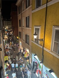 The street below is busy and lively! So much fun so close.