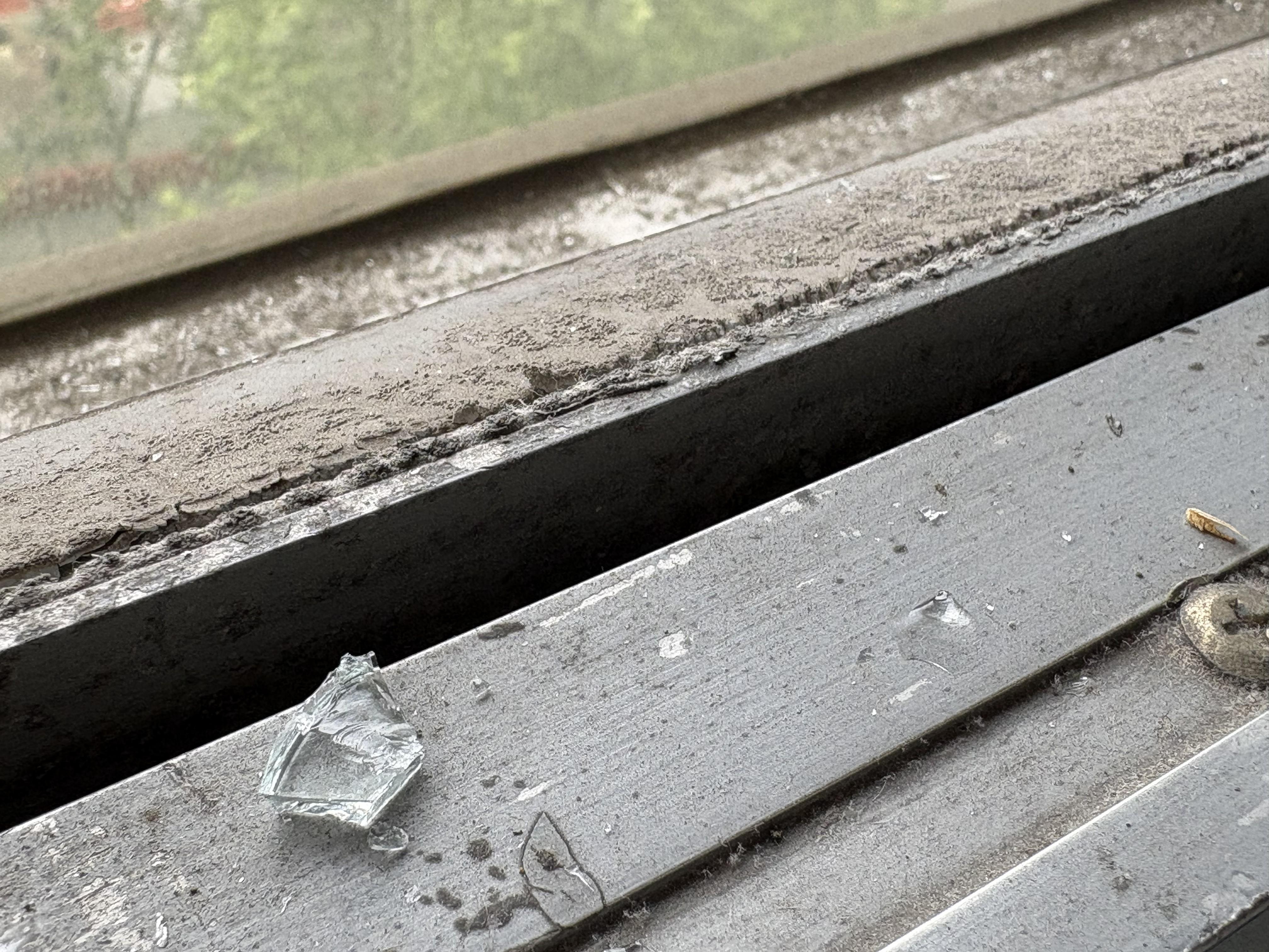 Some of the glass from the broken window