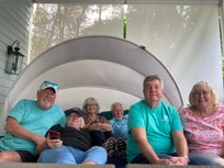 Our gang enjoying the big lounge seating on the deck.