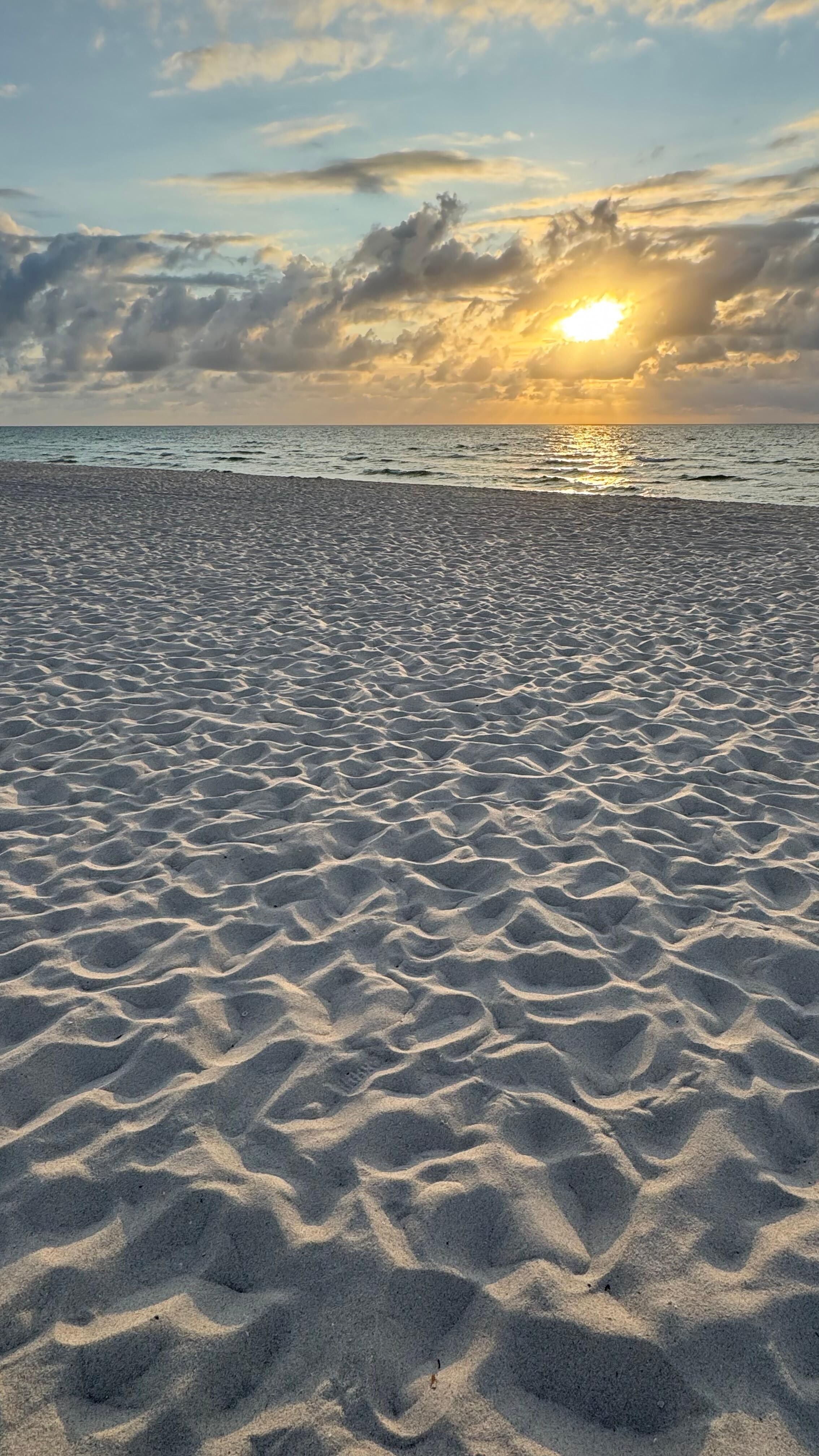 Sunrise on beach in front of the hotel