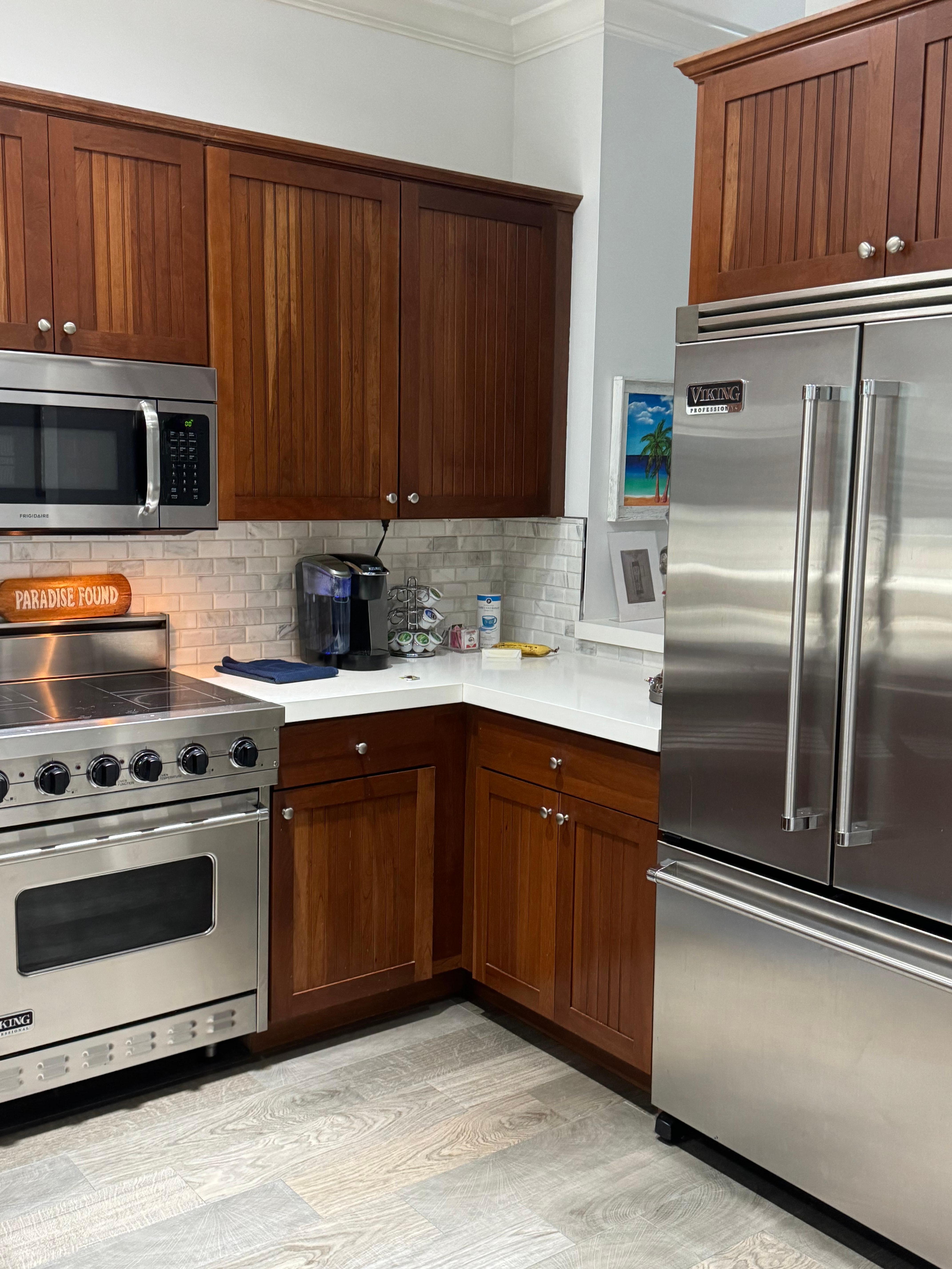 Fully stocked kitchen with Viking appliances.