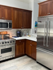 Fully stocked kitchen with Viking appliances.