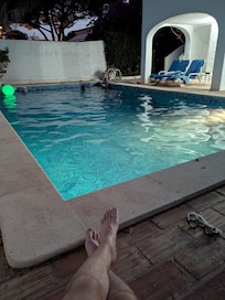 Late night relaxing by the pool