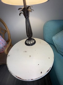 Someone’s Reese cup trash left on the end table