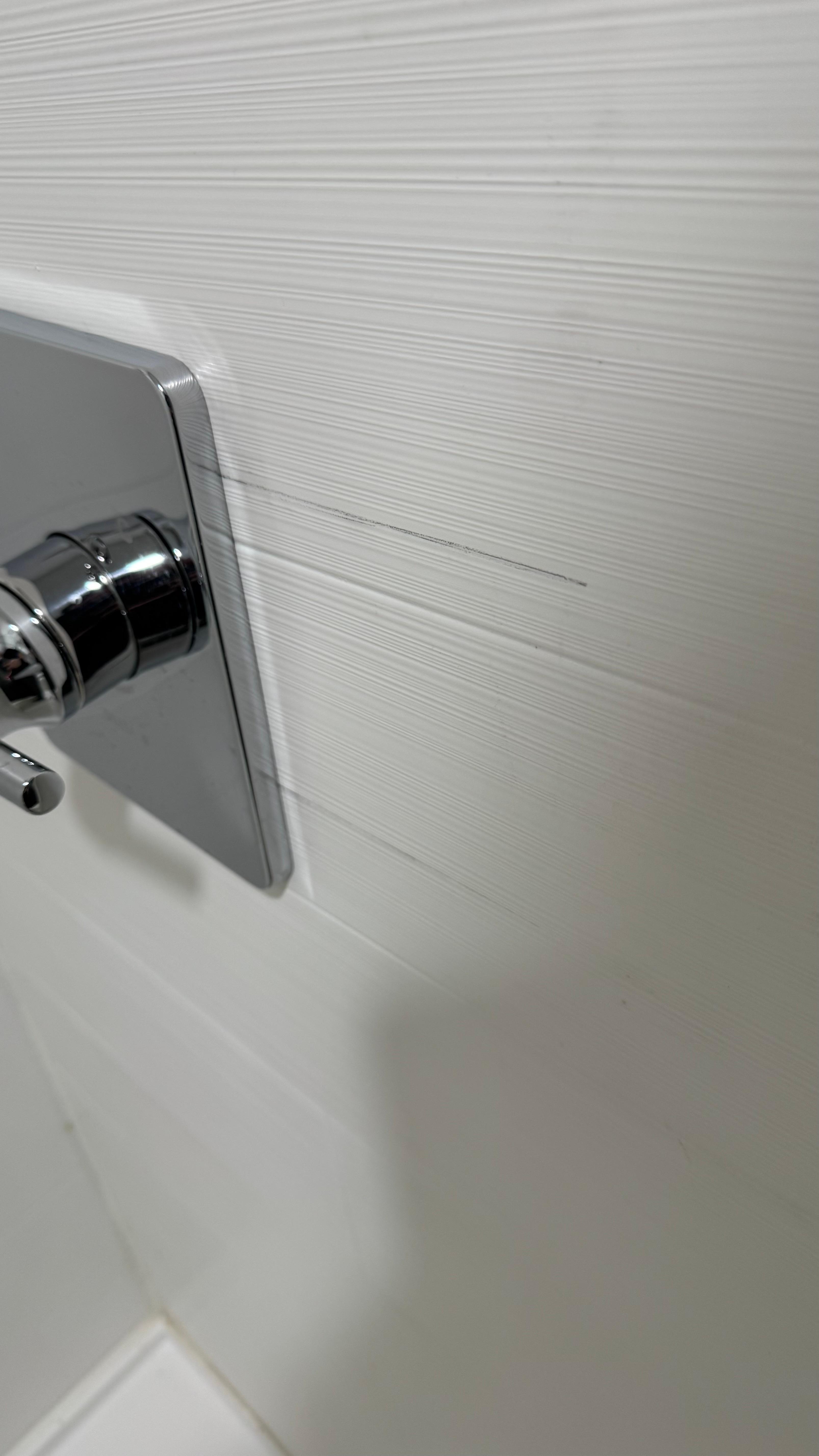 Come on guys, at least check your work! And consider putting a towel rack in the bathroom??