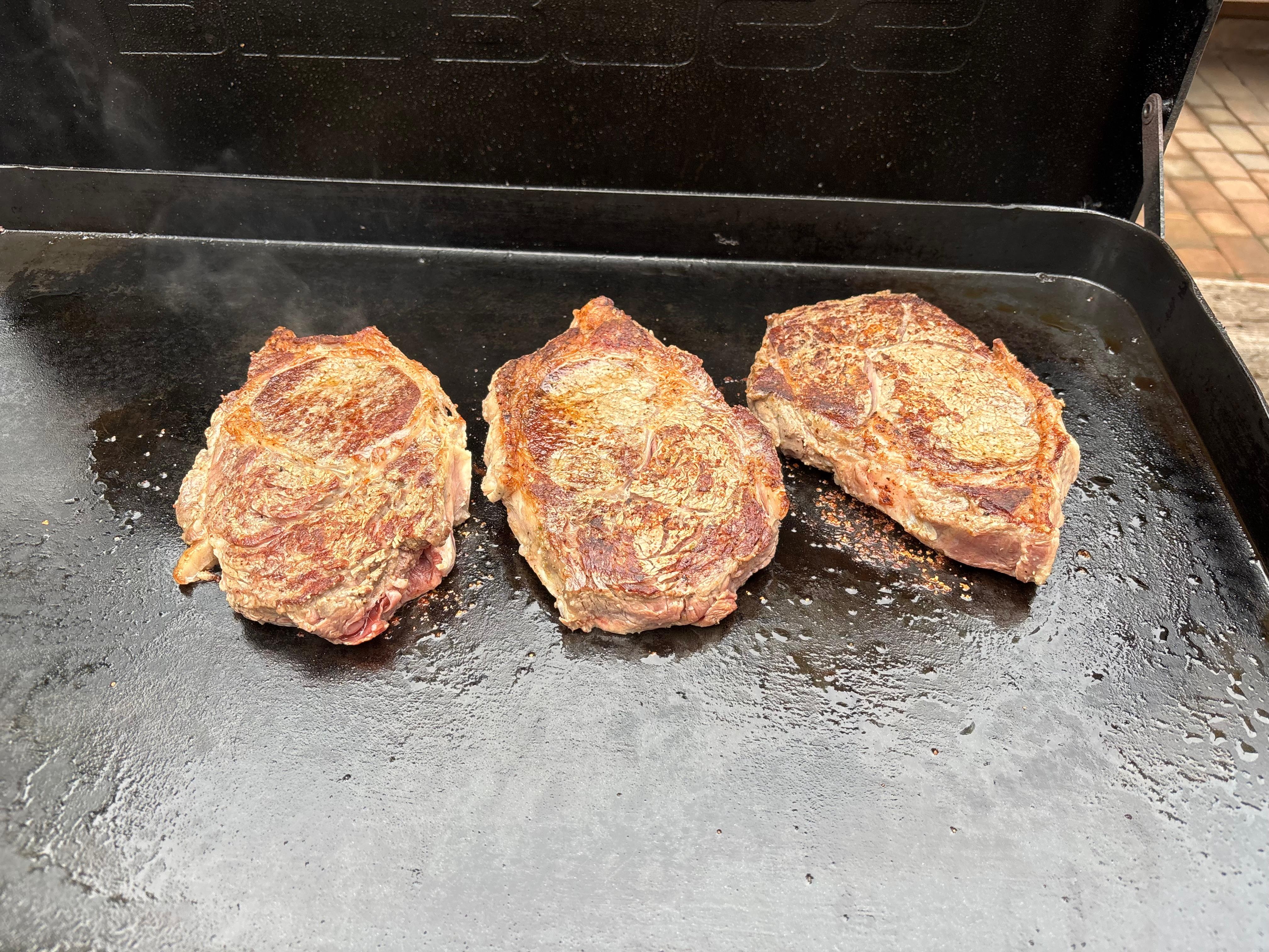 Ribeyes on the flattop griddle