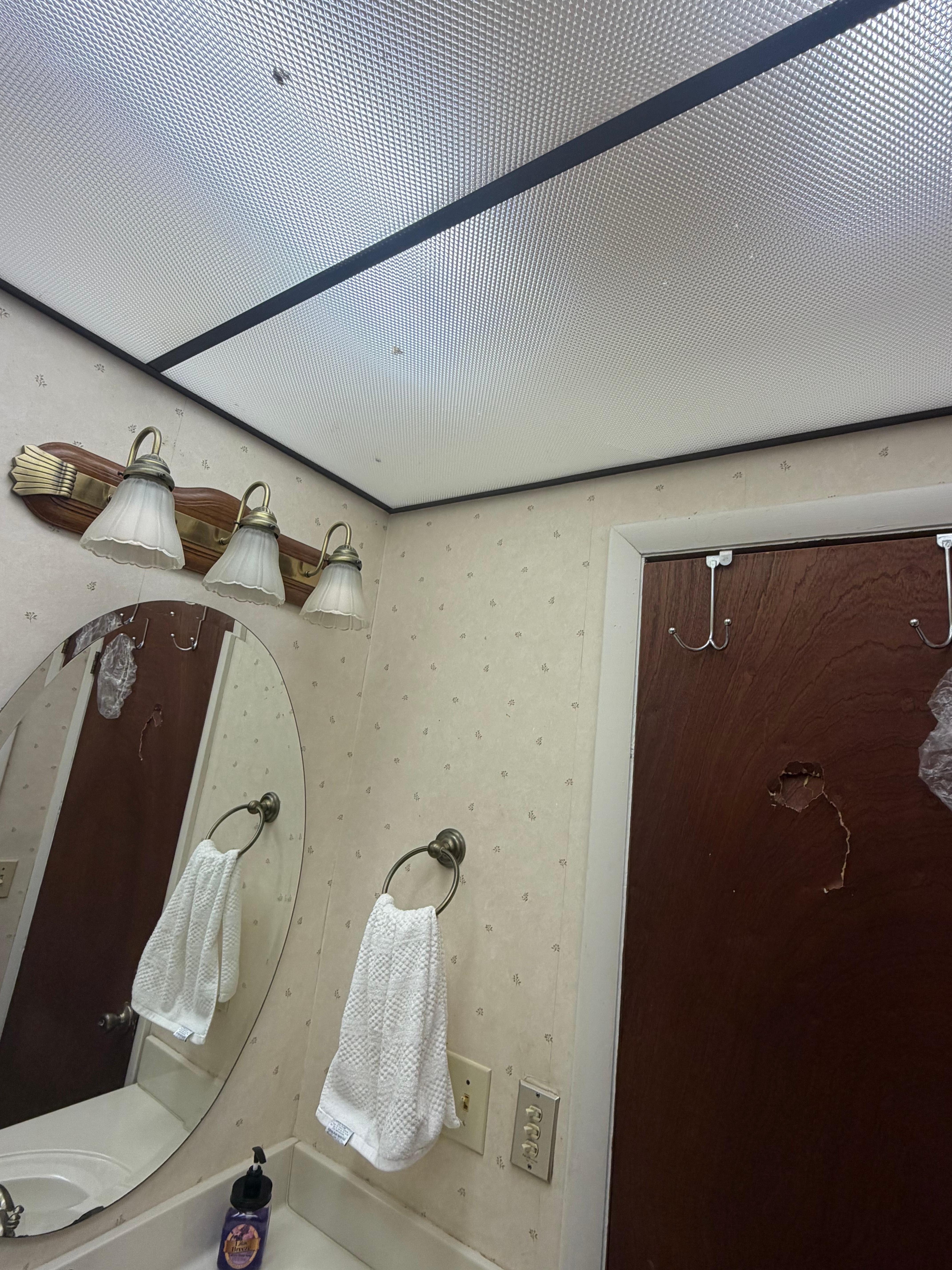 Bugs in the light fixture, hole in the door, light switch that didn’t work correctly. 