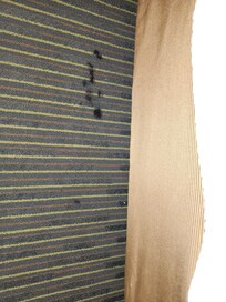 Carpet where you place your feet if sitting on a queen bed