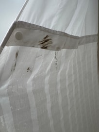 grease or dirt on shower curtain