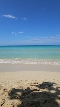 Beautiful beach steps away.