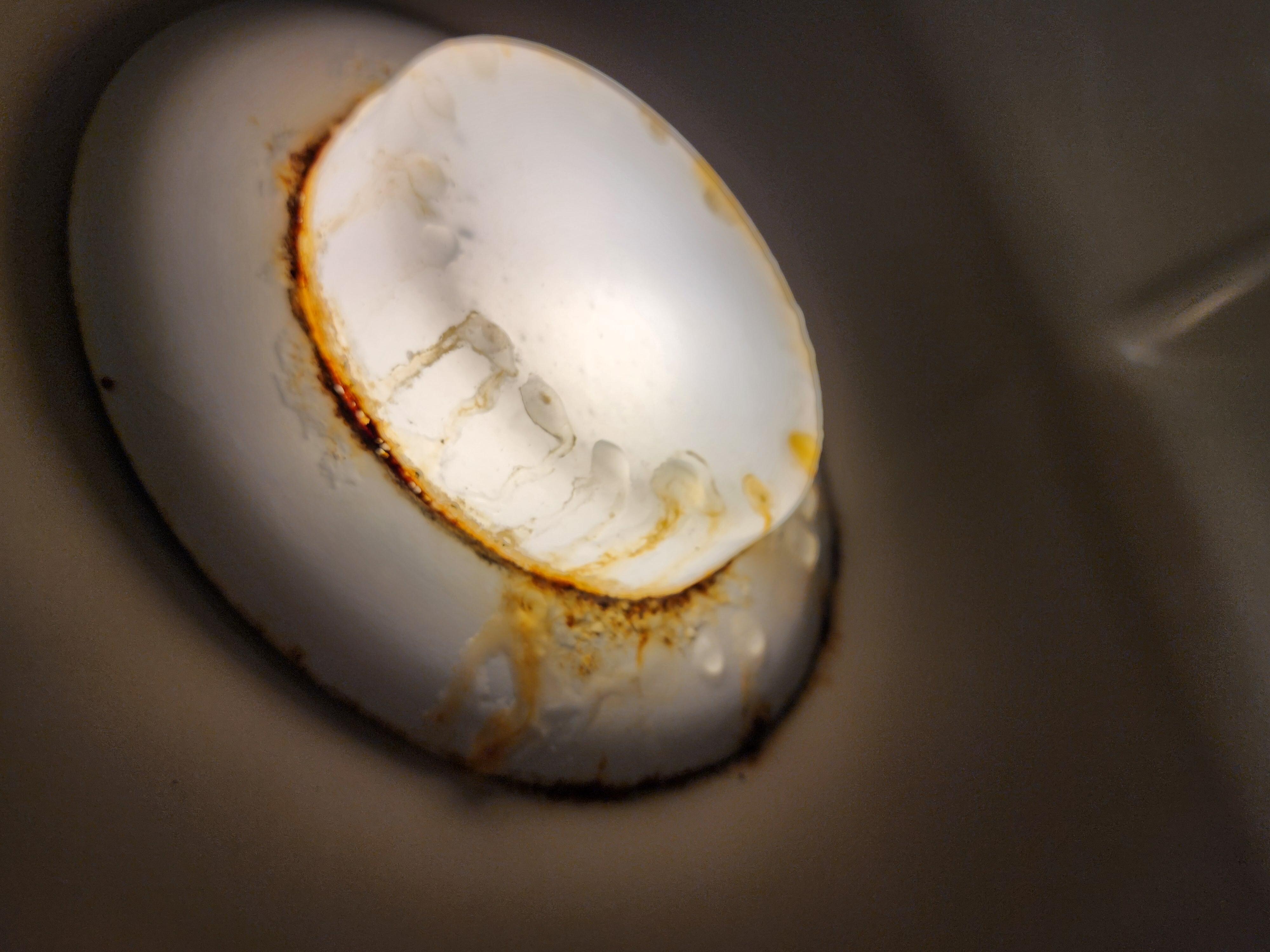 Rusty light in shower dripping cold water while showering 