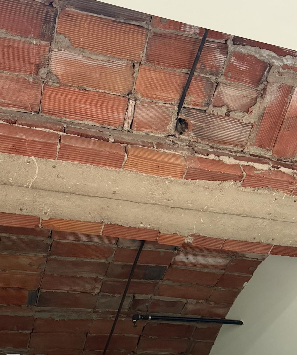 unfinished ceiling of the bedroom