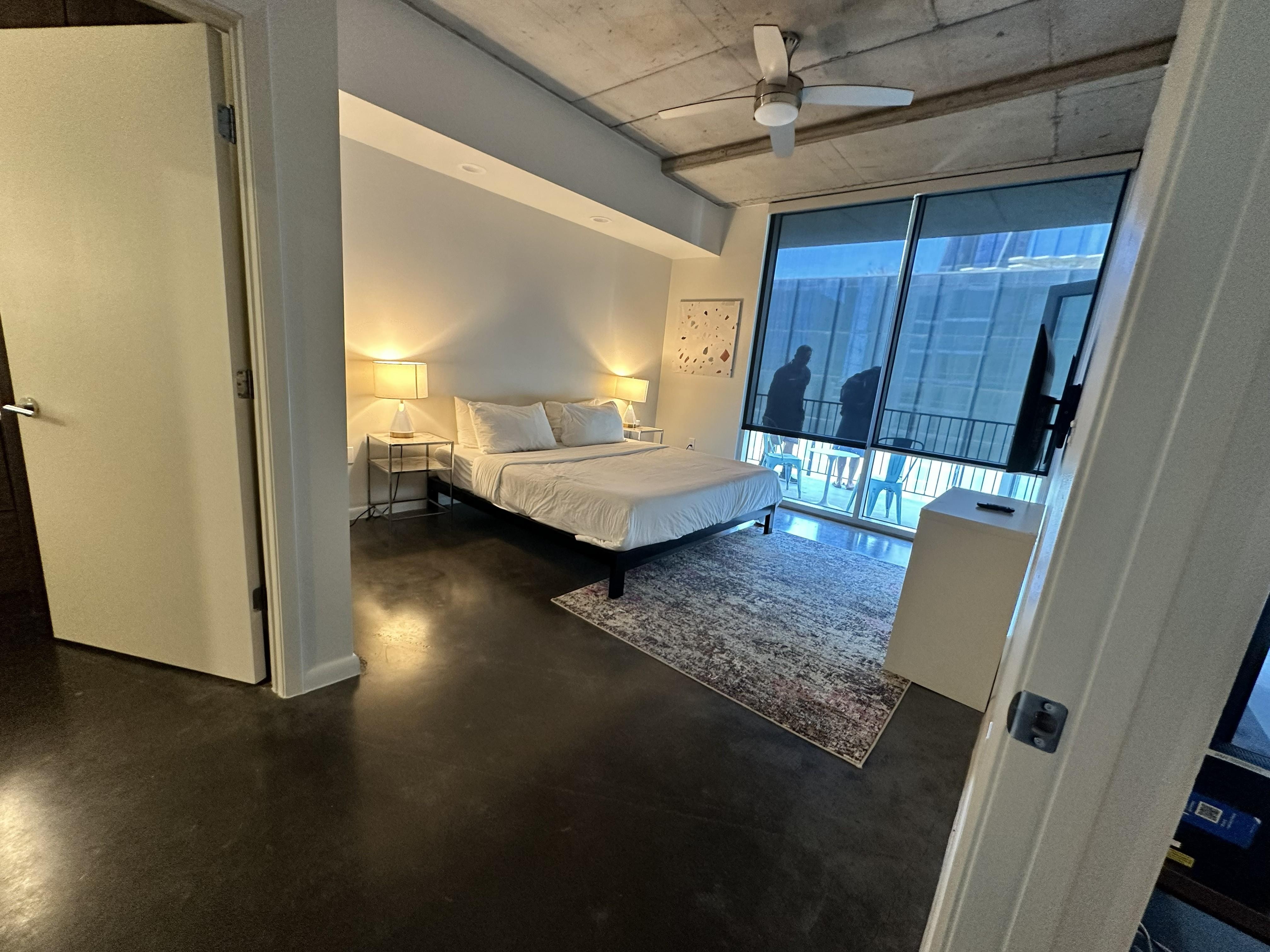 The master bedroom with an additional TV.