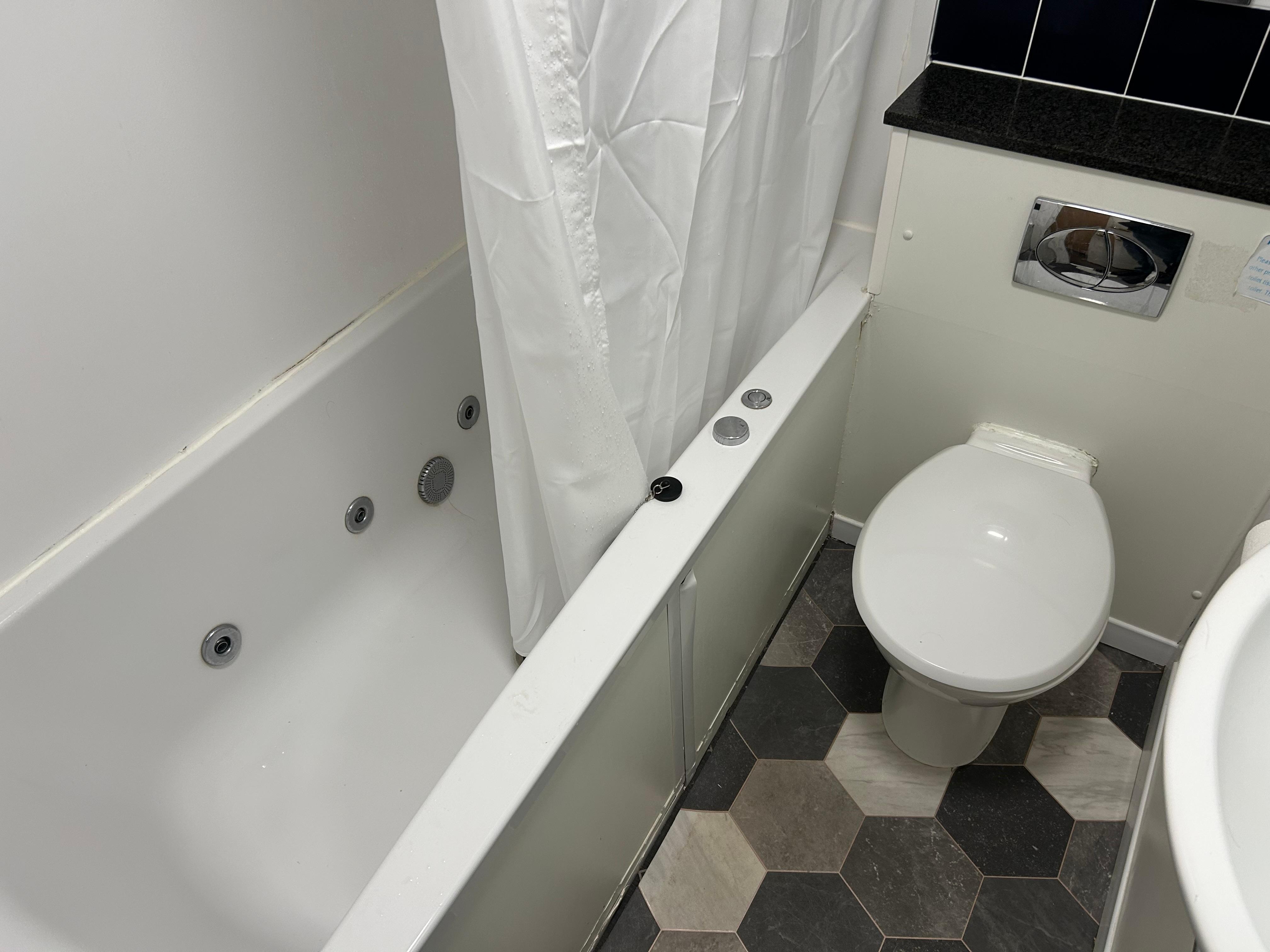 Bathroom was very poor in condition and cleanliness. The bath side was way above average and my wife needed help getting in and out.