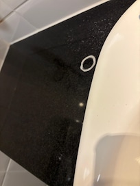 Toothpaste left around the sink