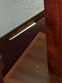 A set of unused chop sticks along side the base board. Not ours.