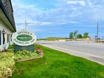 Fantastic location by the shore, looking at the lighthouse and channel.