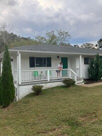 My son hanging out out on the porch.